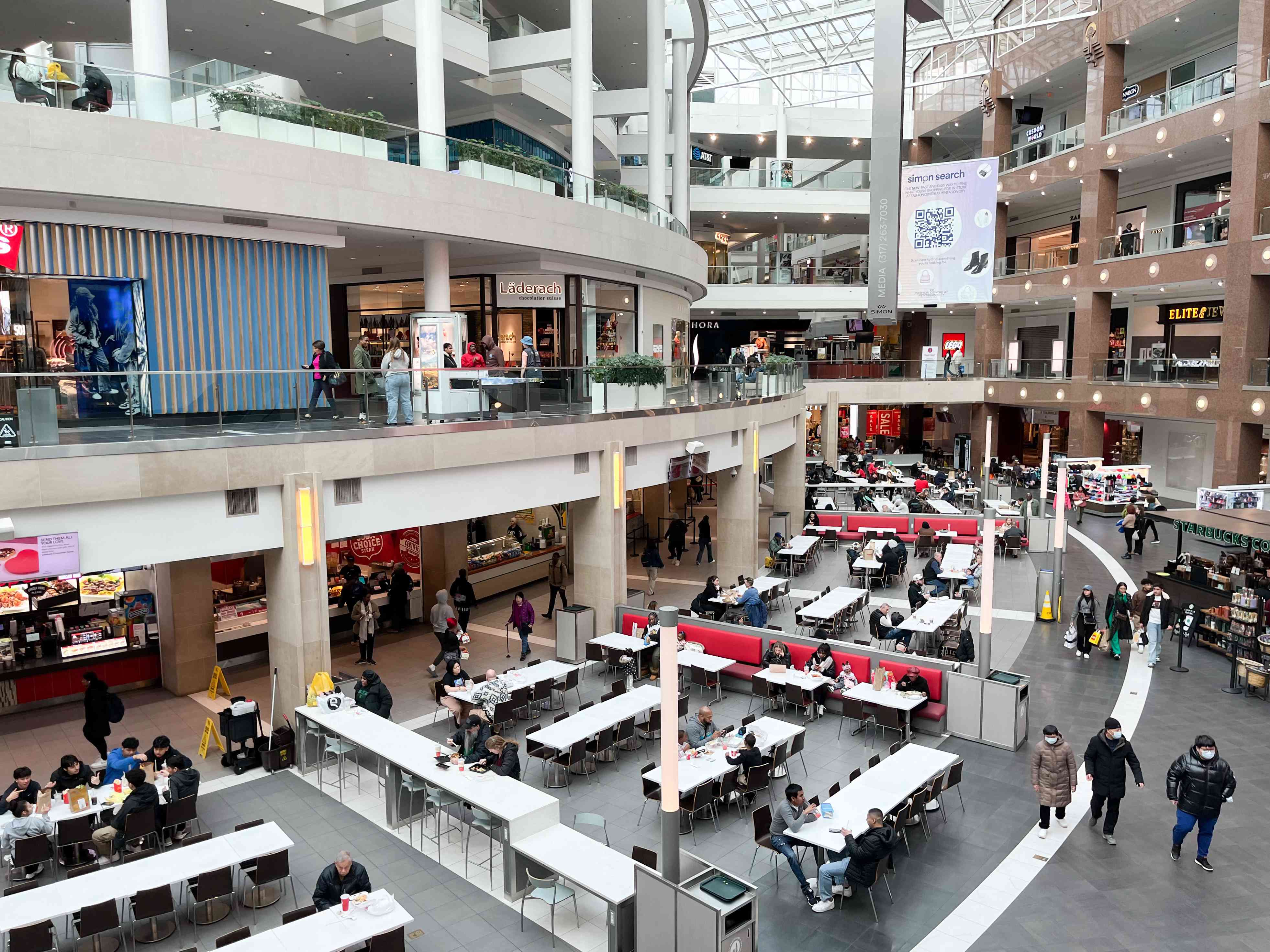 Shoppers walk through the Fashion Centre at Pentagon City, a shopping mall in Arlington, Virginia, February 2, 2024.