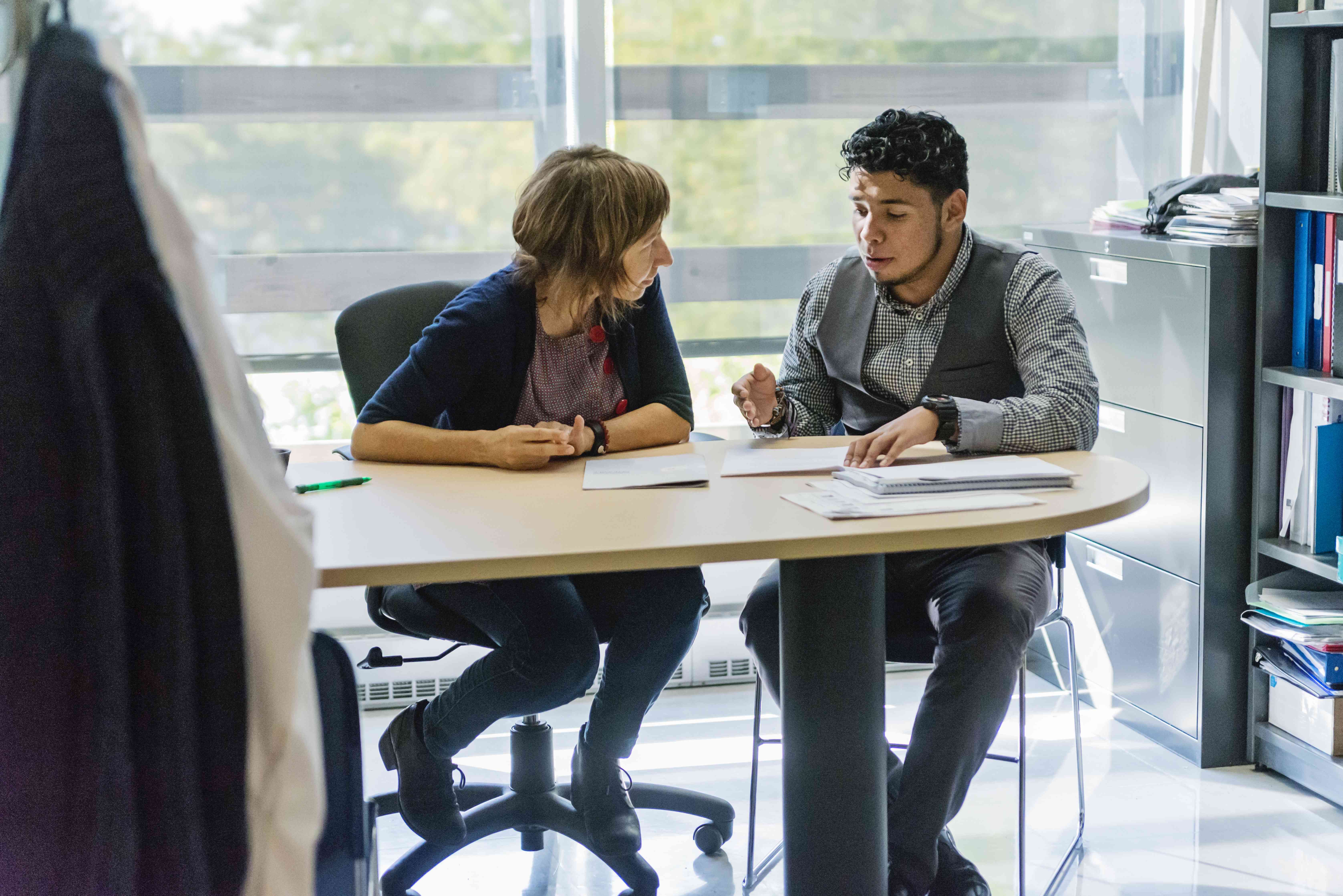 Student talks to lender about potentially getting a personal loan