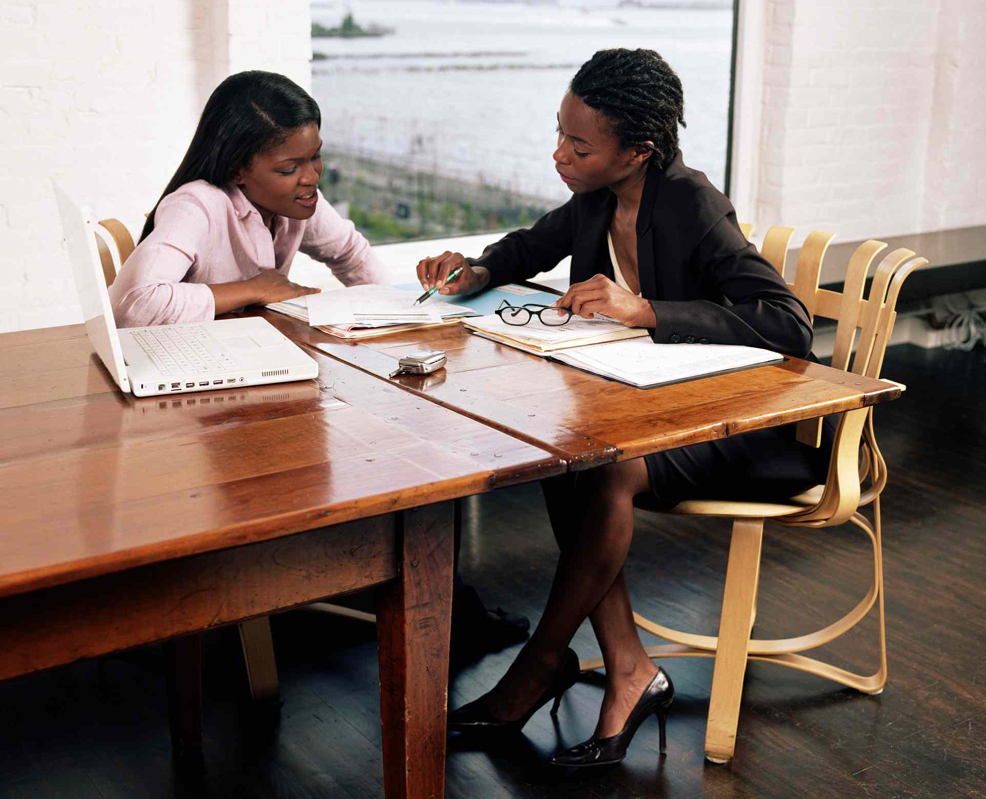 Young woman meeting with advisor