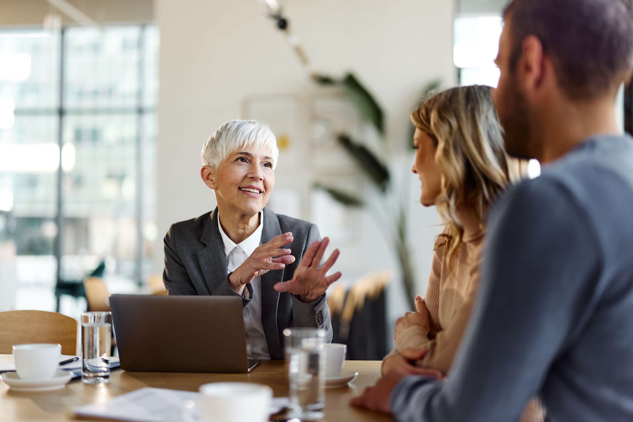 An executive consults with a couple.