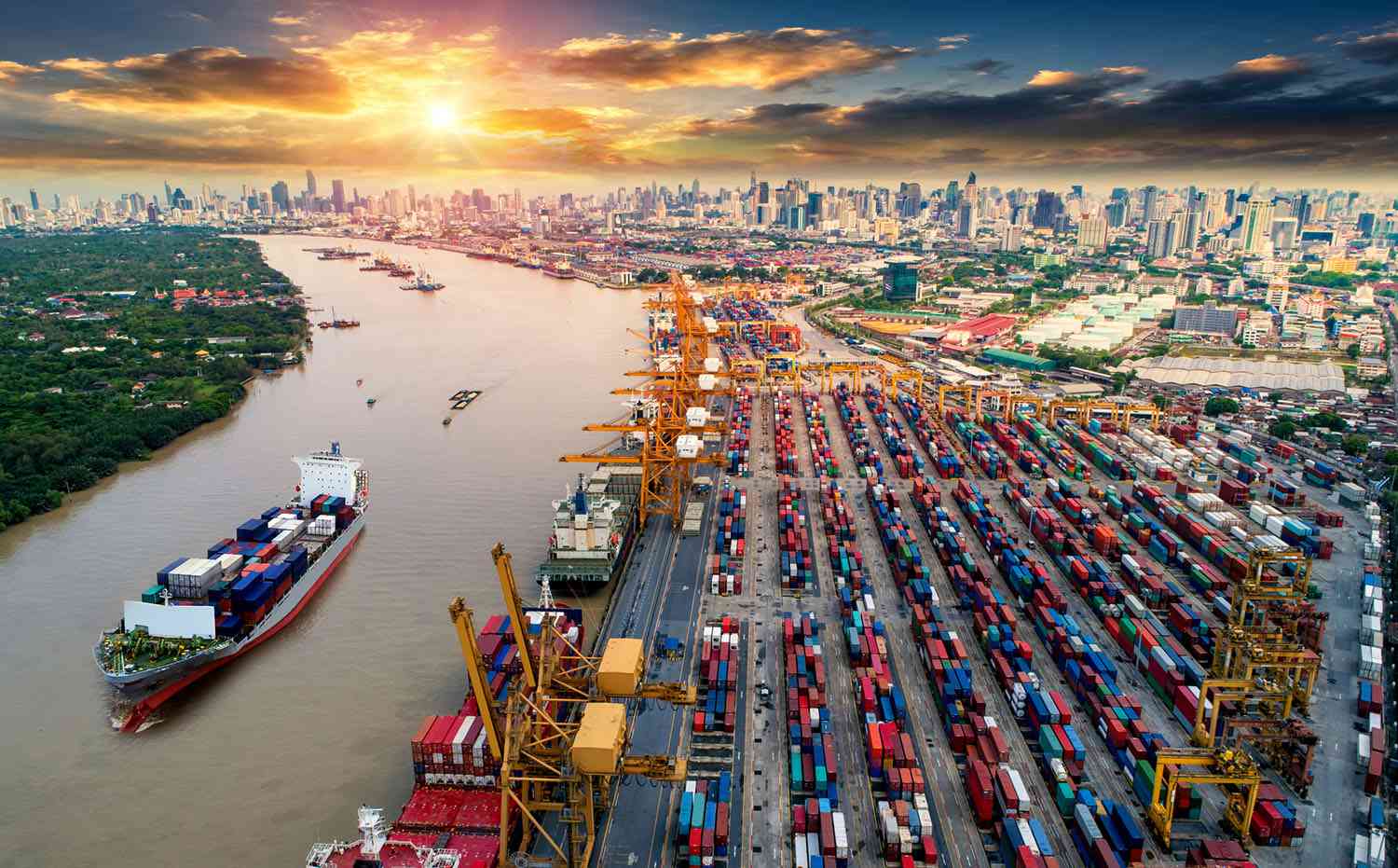 Container Cargo Ship and Cargo Plane With Working Crane Bridge in Shipyard at Sunrise