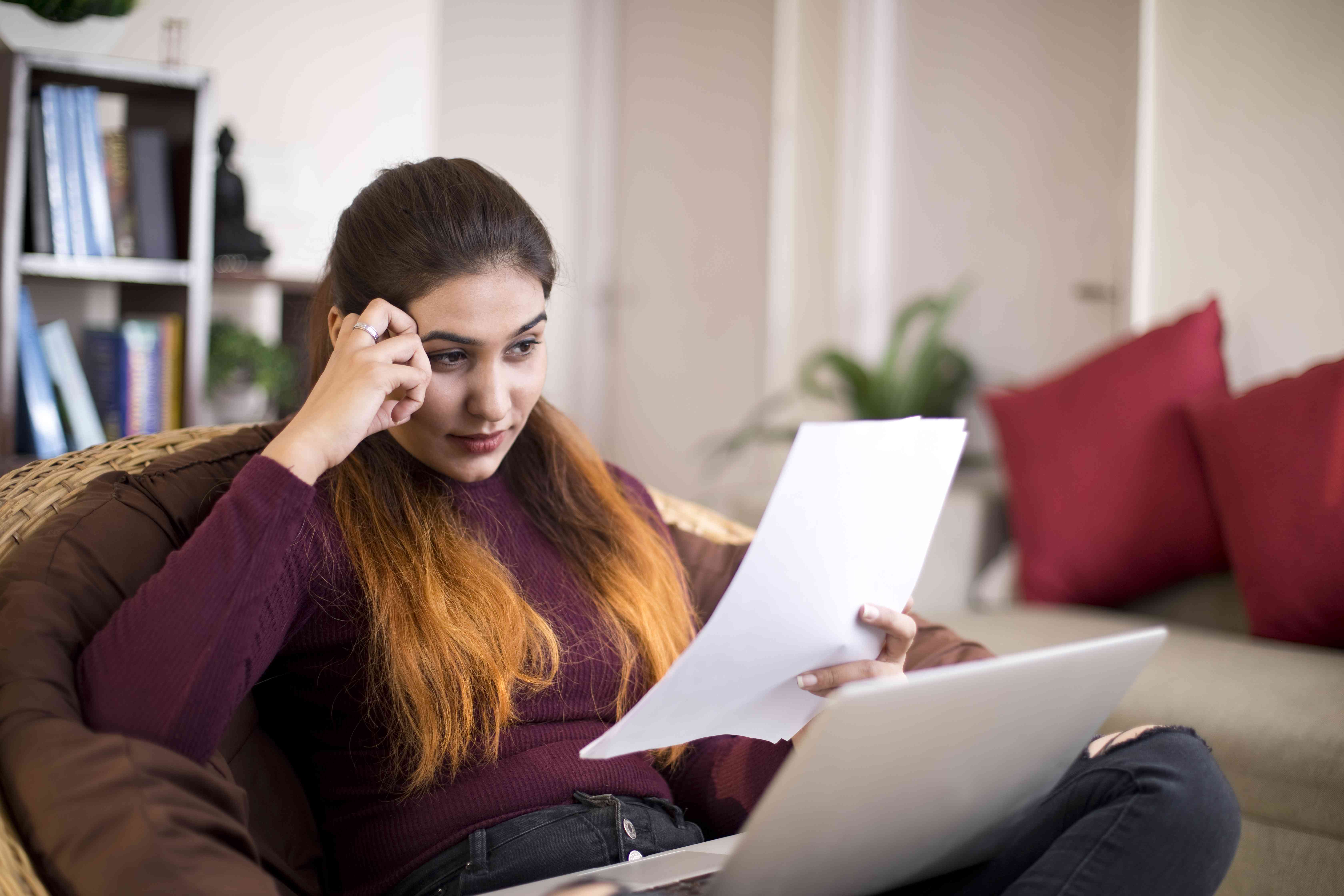 Woman Looking at Paper