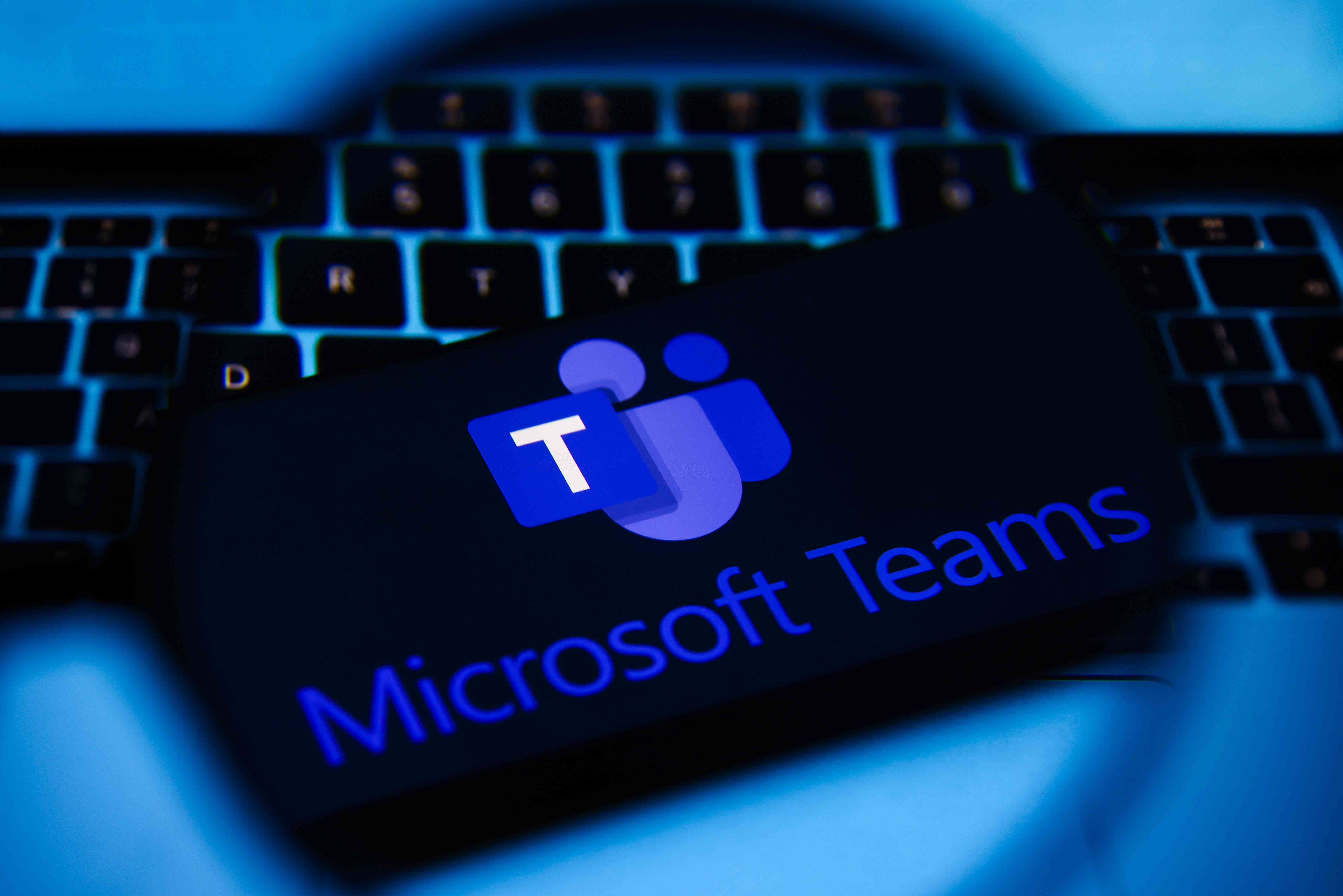 Microsoft Teams logo is screened on a mobile phone for illustration photo