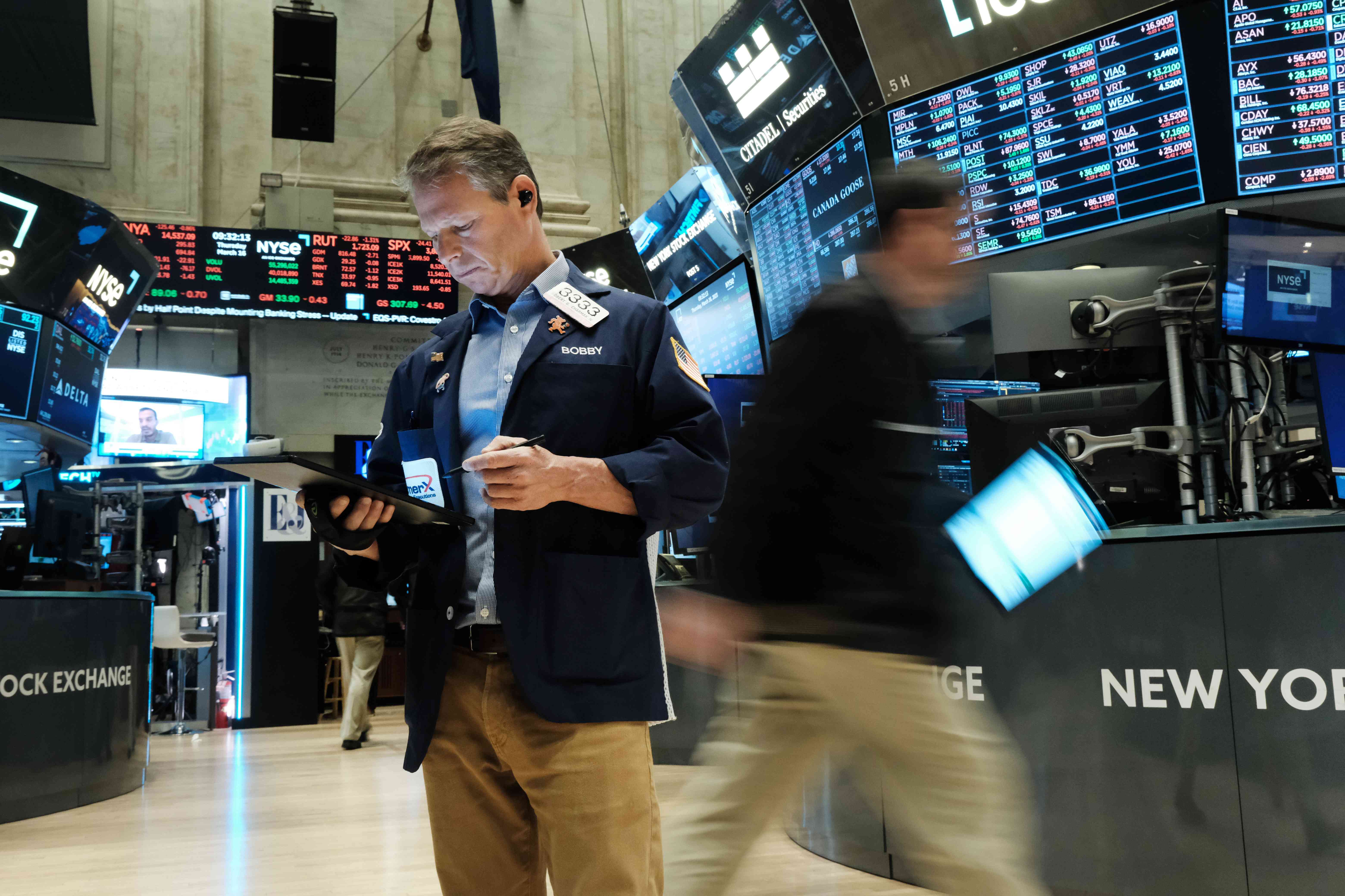 Traders on the floor of the stock exchange