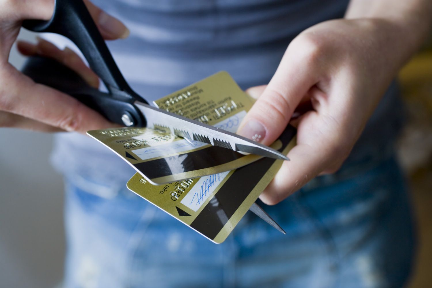 Cutting Two Credit Cards with Scissors