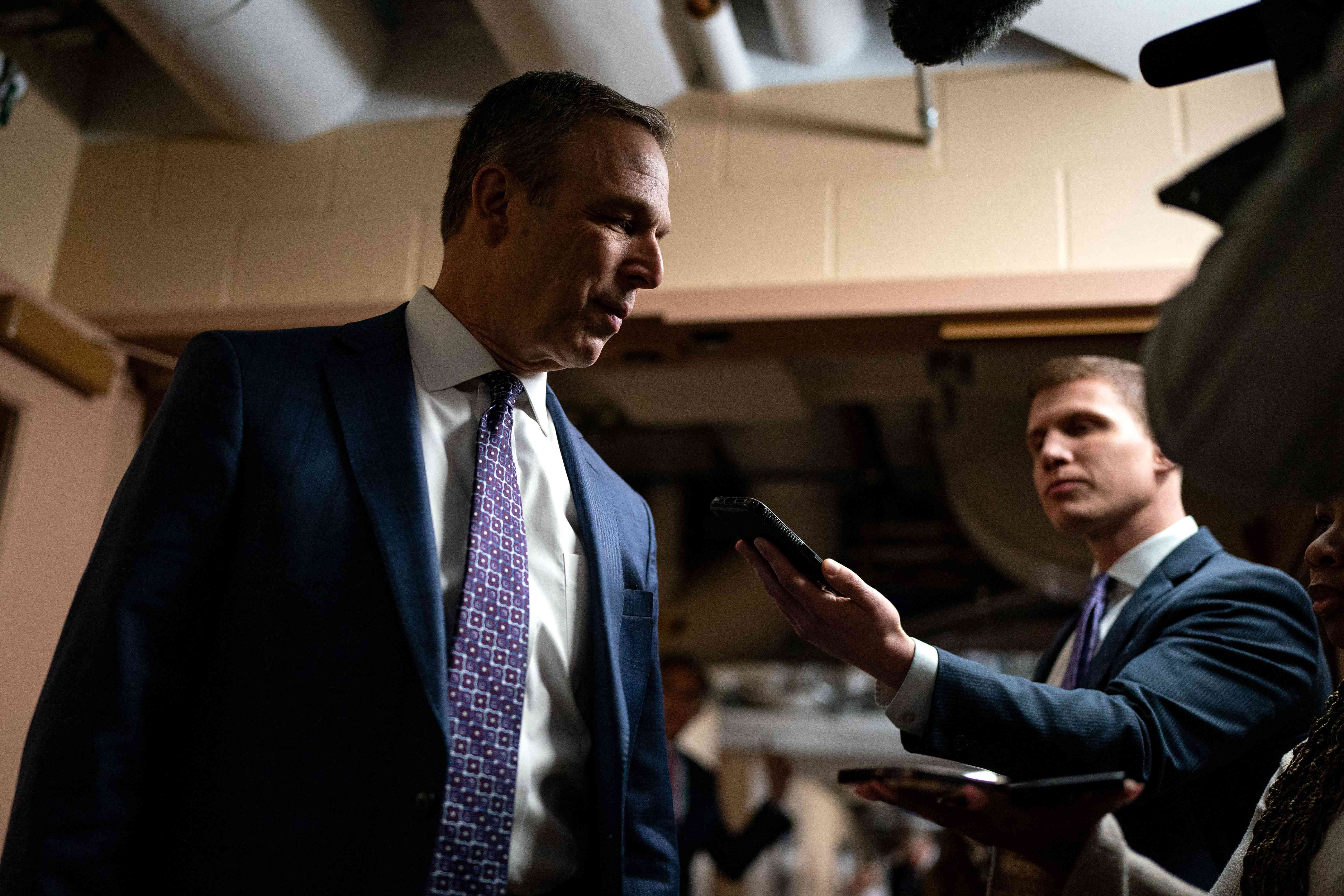 Representative Scott Perry, a Republican from Pennsylvania, left, speaks to members of the media while arriving for a House Republican caucus meeting at the US Capitol in Washington, DC, US, on Thursday, Feb. 29, 2024. 