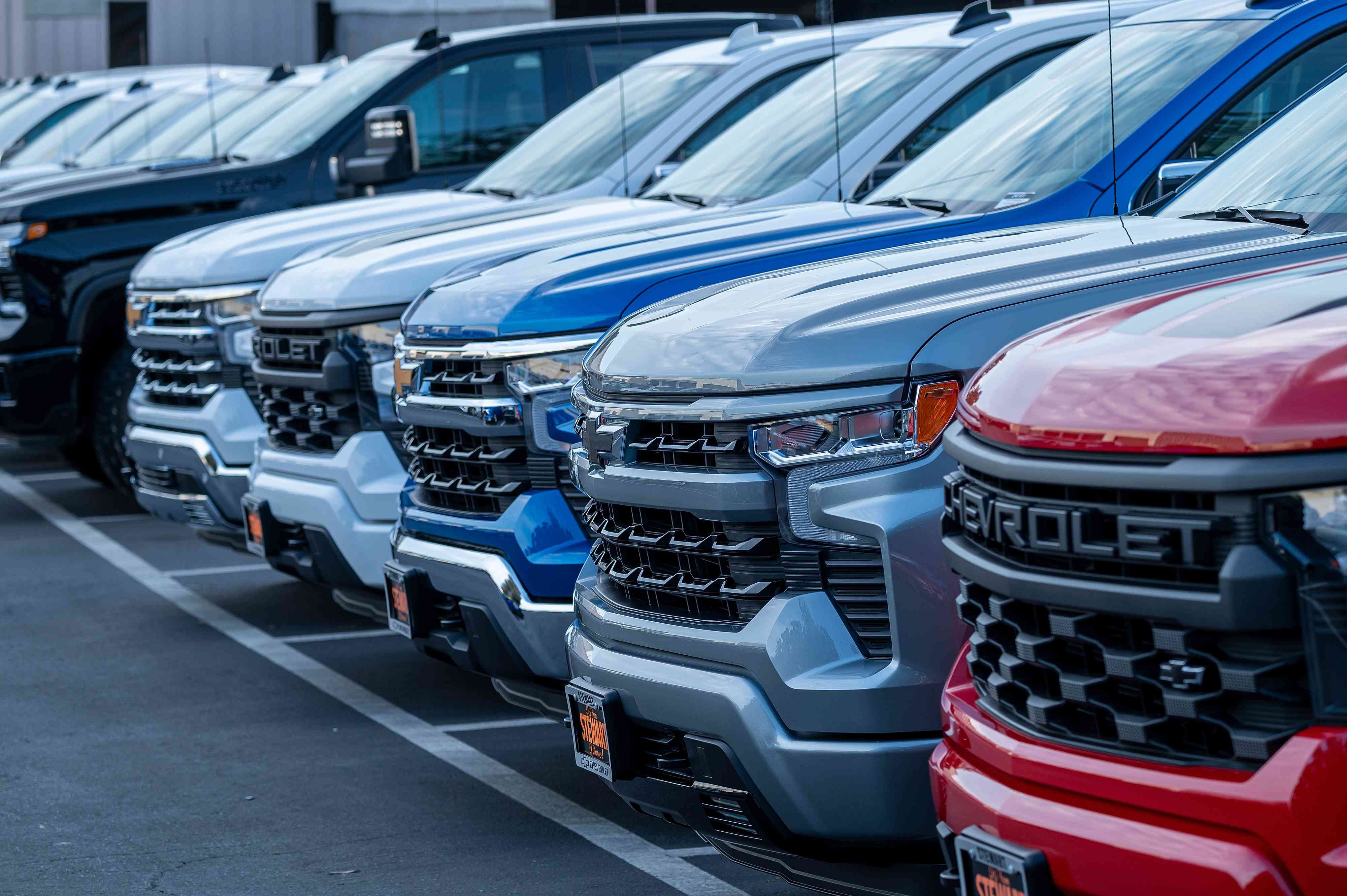 Chevrolet Silverado pick-up trucks at a dealership in Colma, California