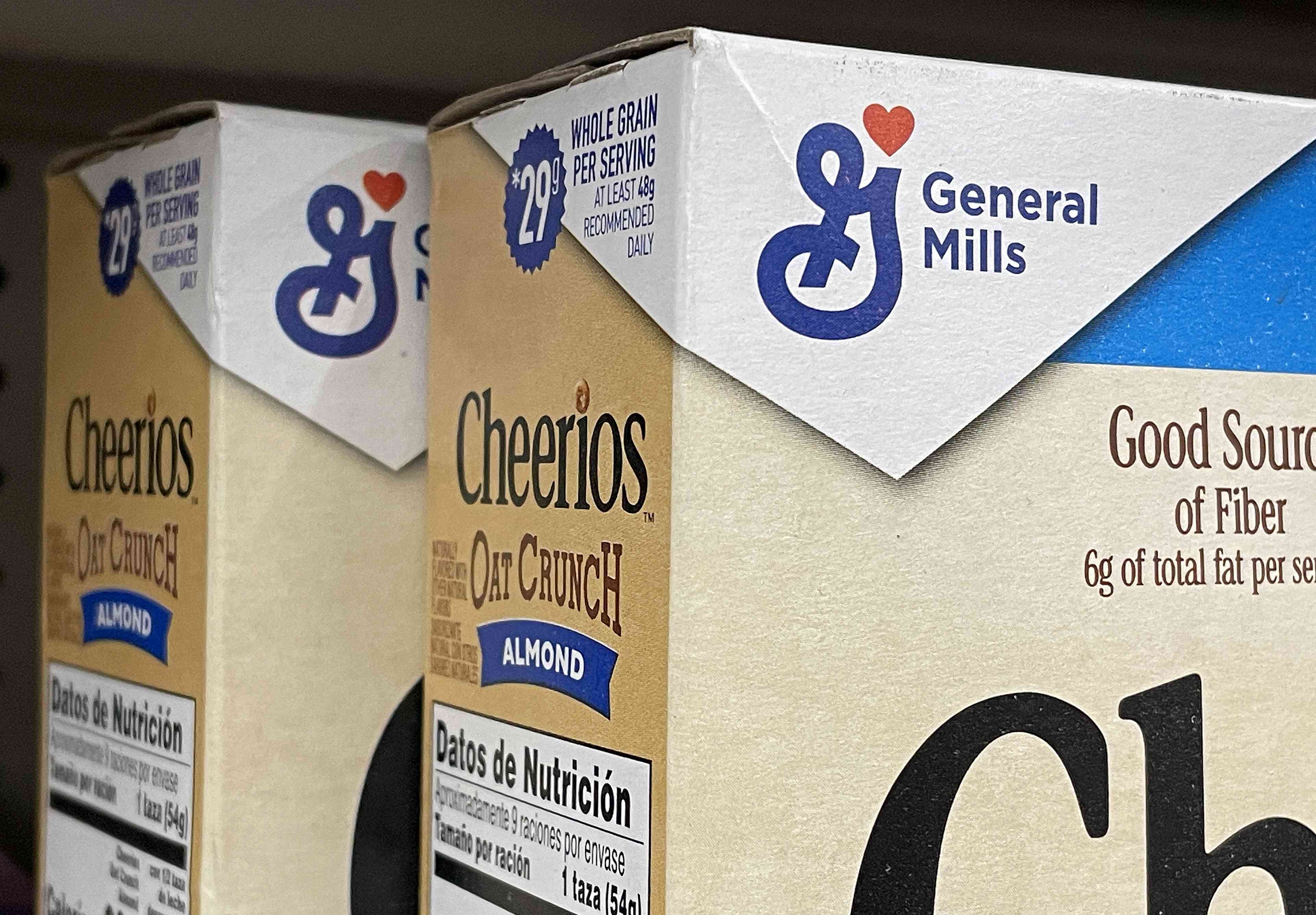 Boxes of General Mills cereal are displayed on a grocery store shelf on December 20, 2023 in San Anselmo, California