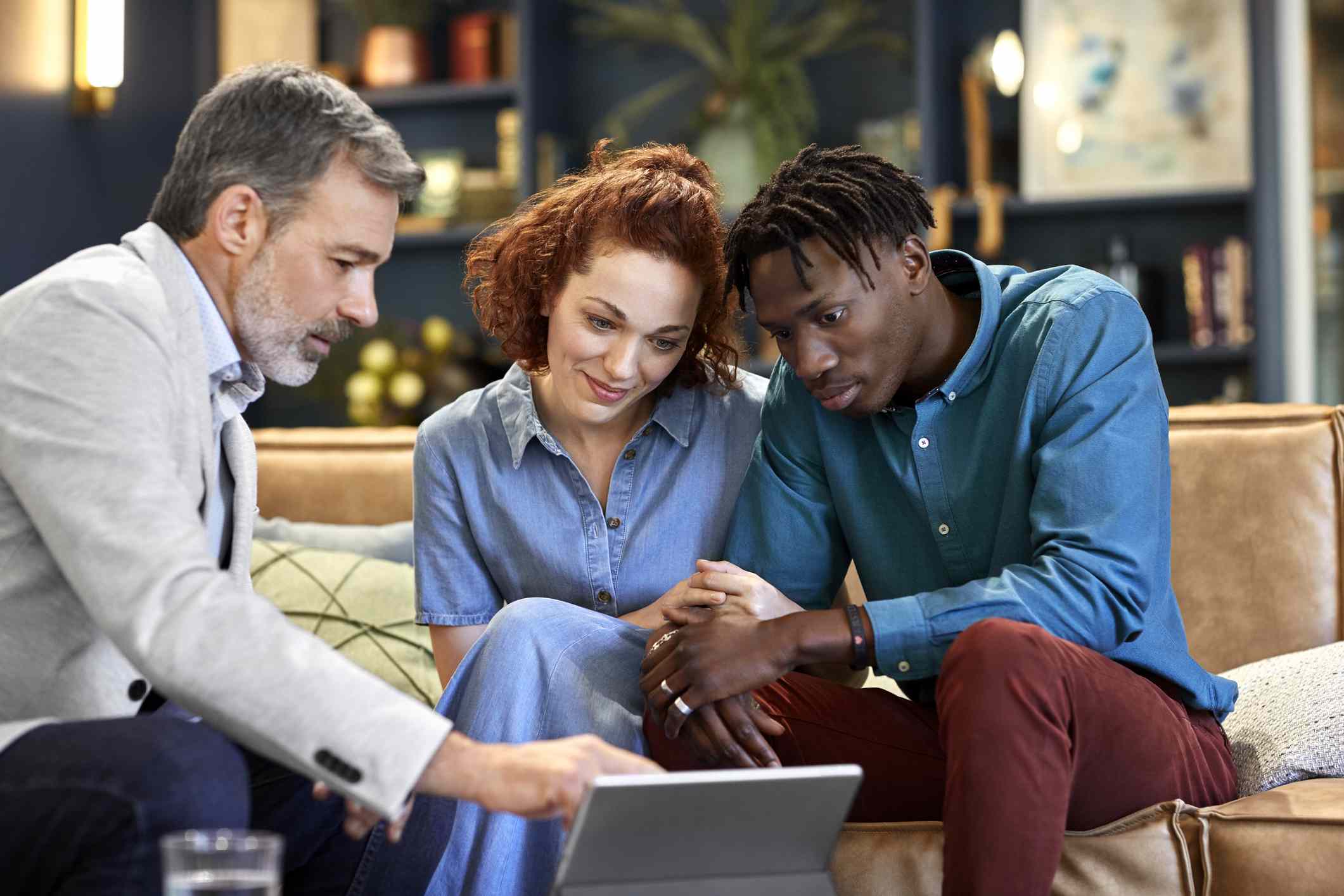 Young Couple With Financial Advisor