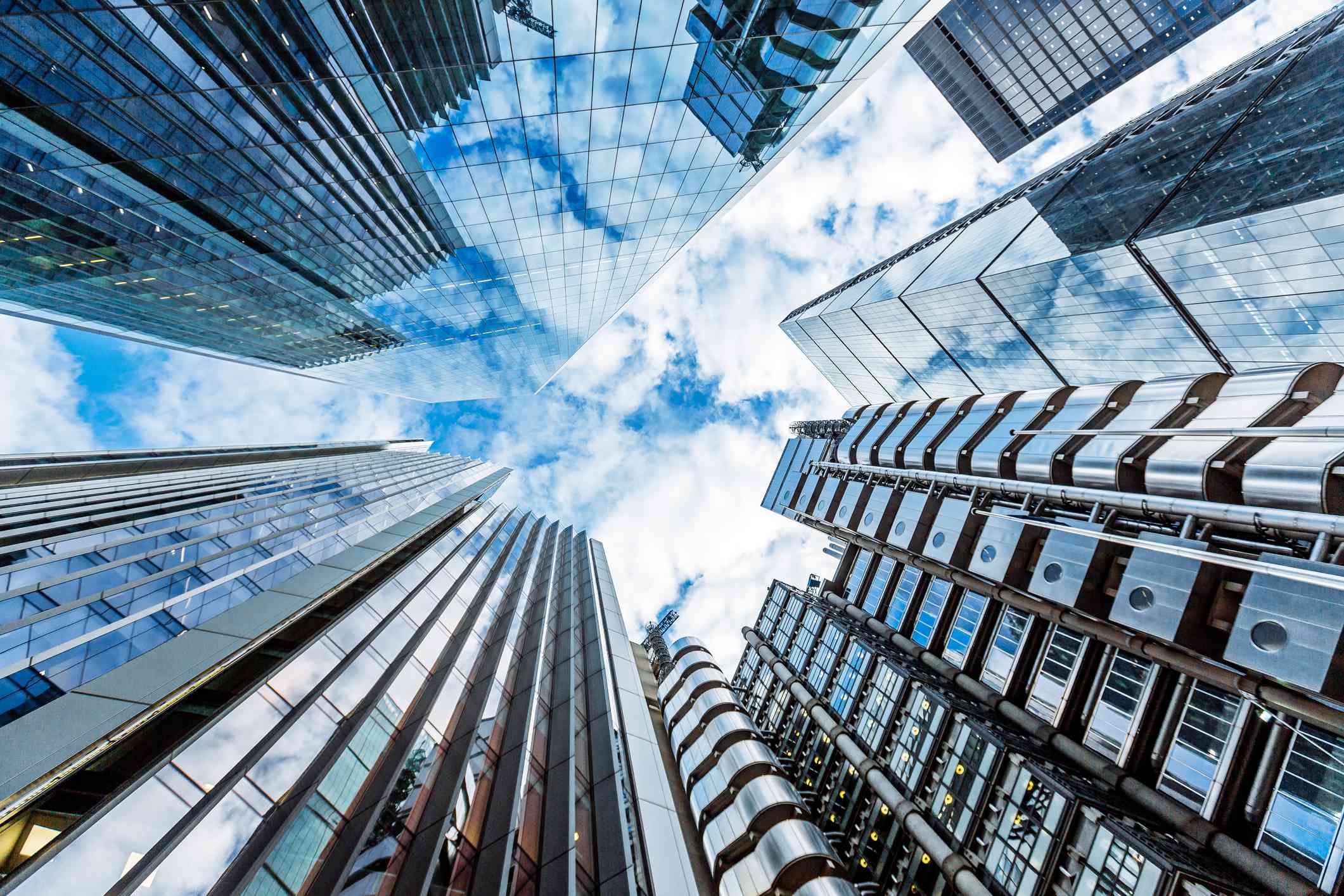 Looking up at skyscrapers in London