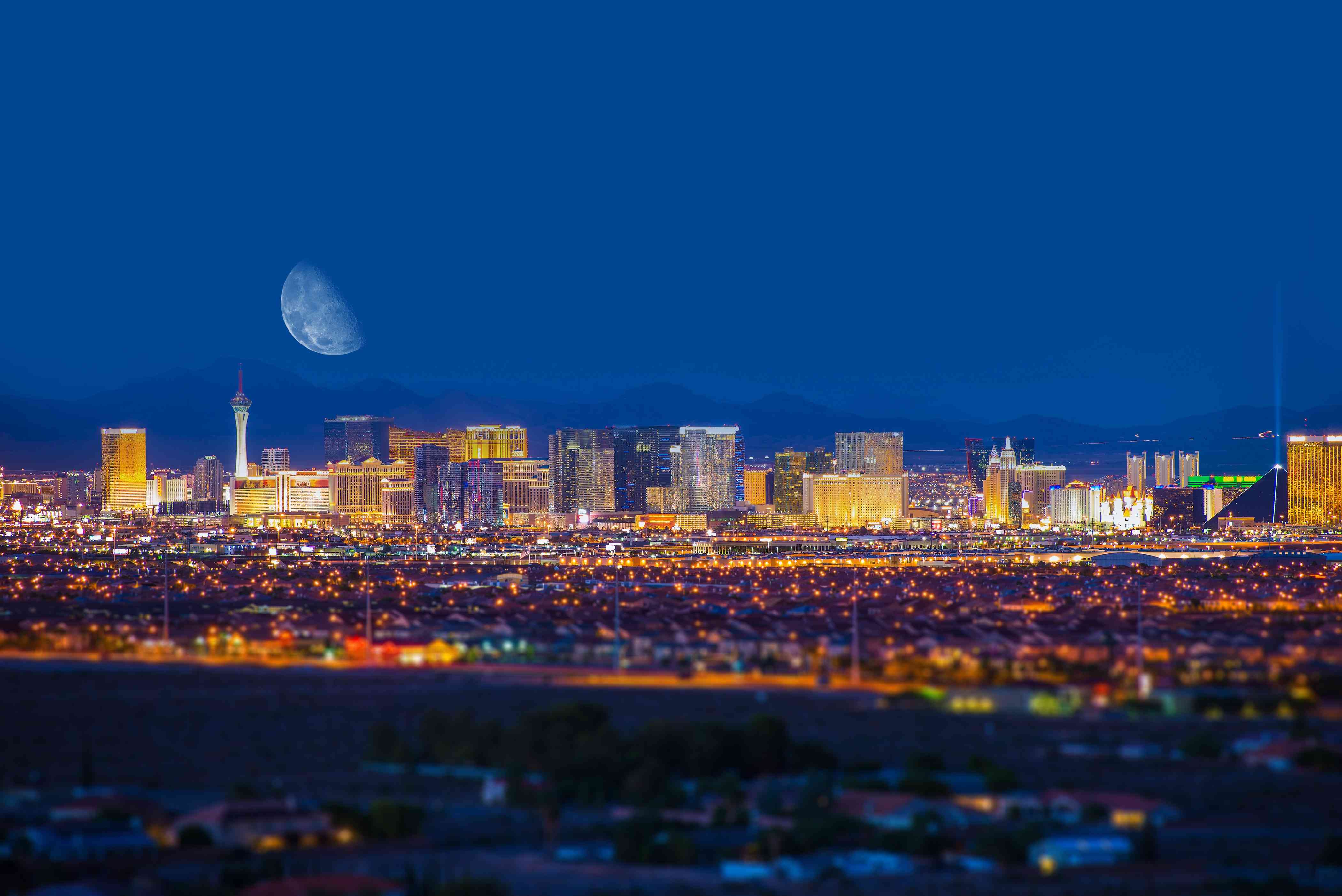 Illuminated Buildings In City At Night