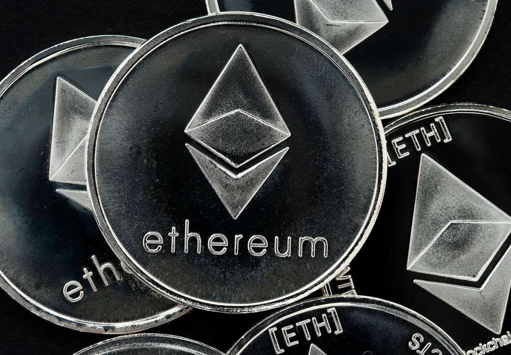 Coins with "ethereum" on them representing cryptocoins