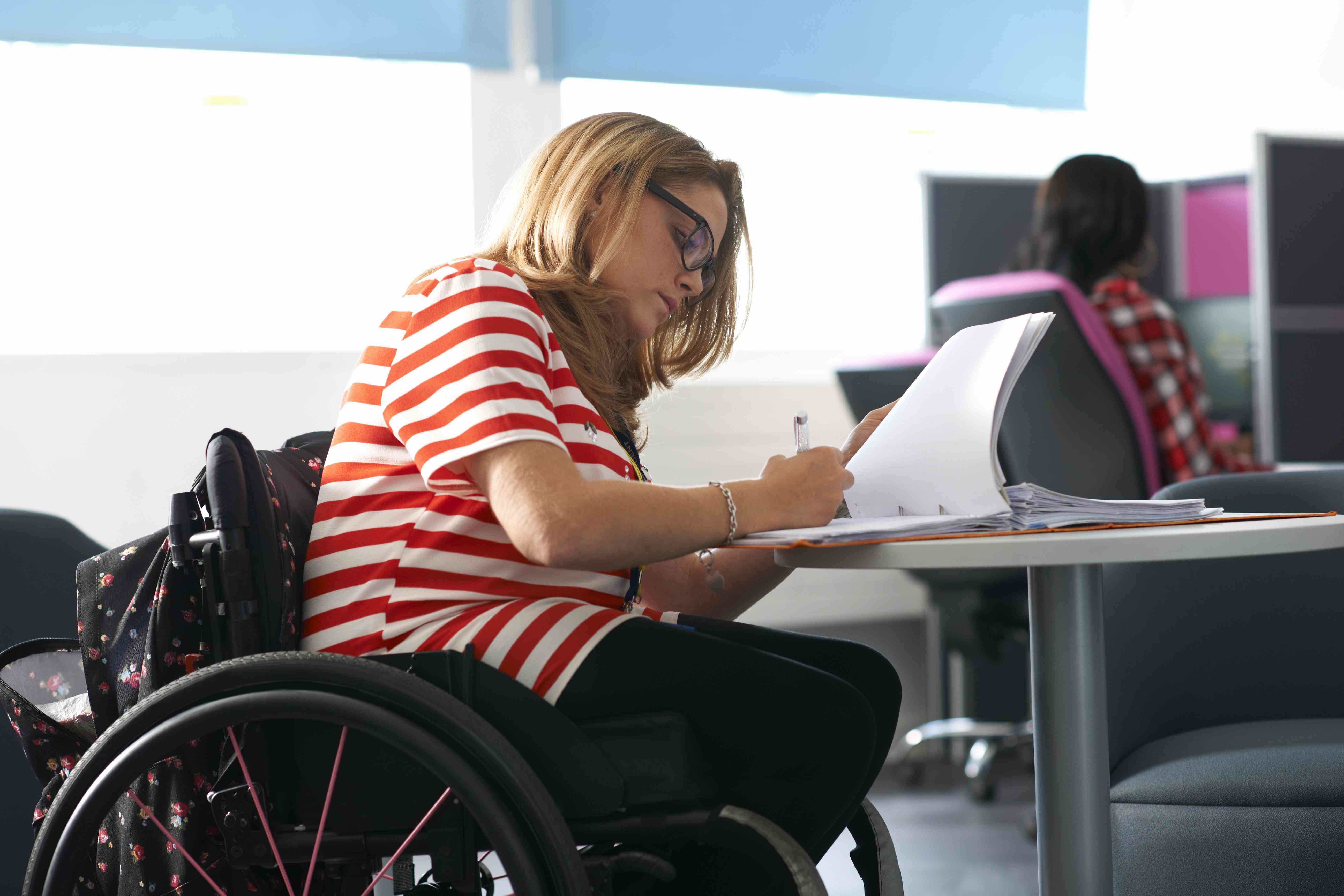 Unemployed woman fills out personal loan application