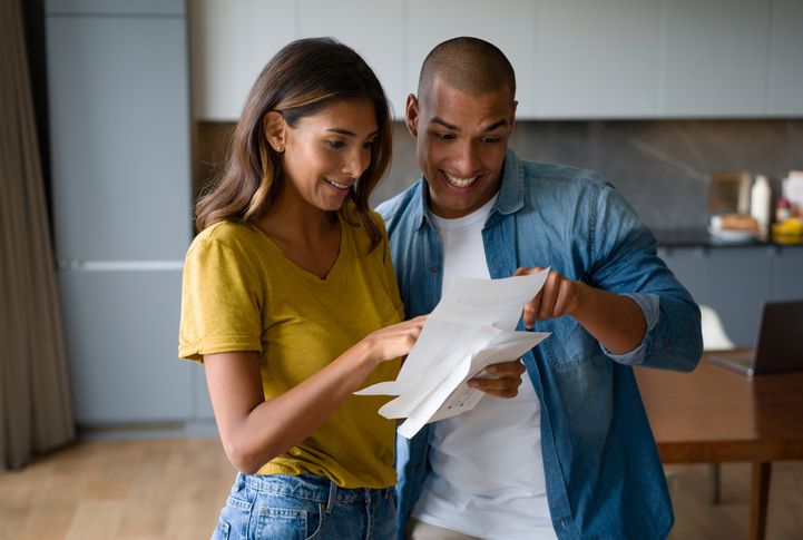 Mother and son reading letter