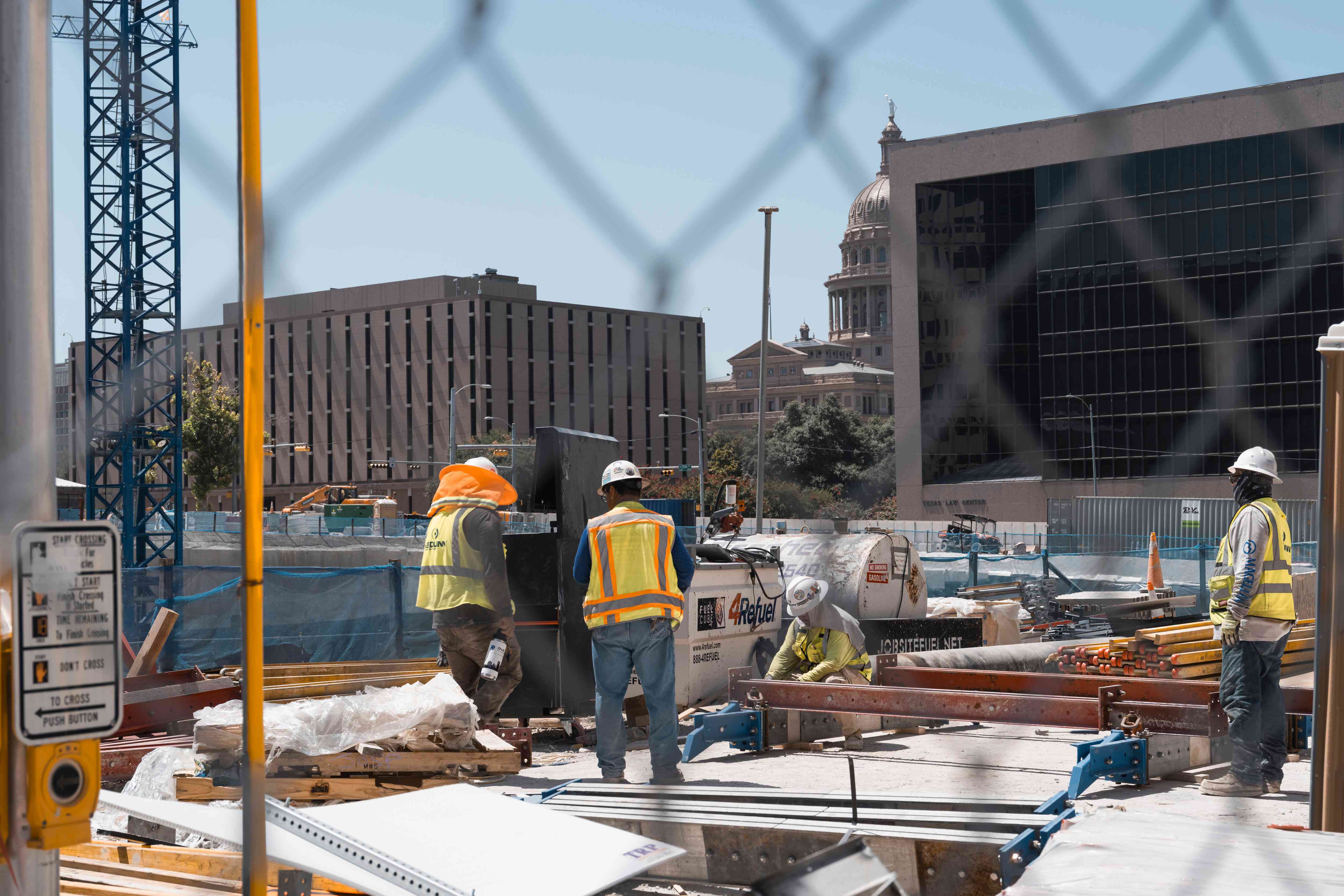 Construction workers in Austin, Texas, US, on Tuesday, July 2, 2024.