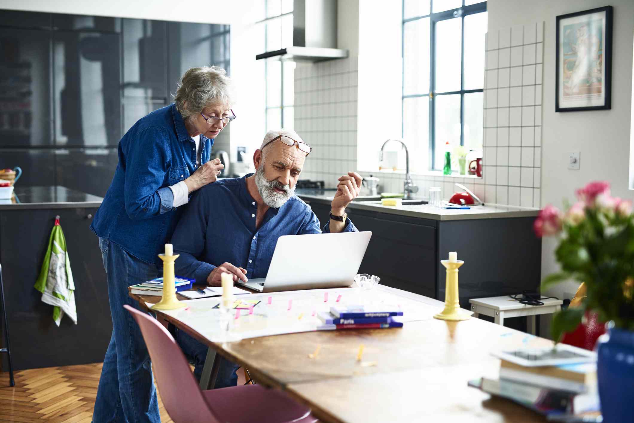 Senior couple looking at financial info