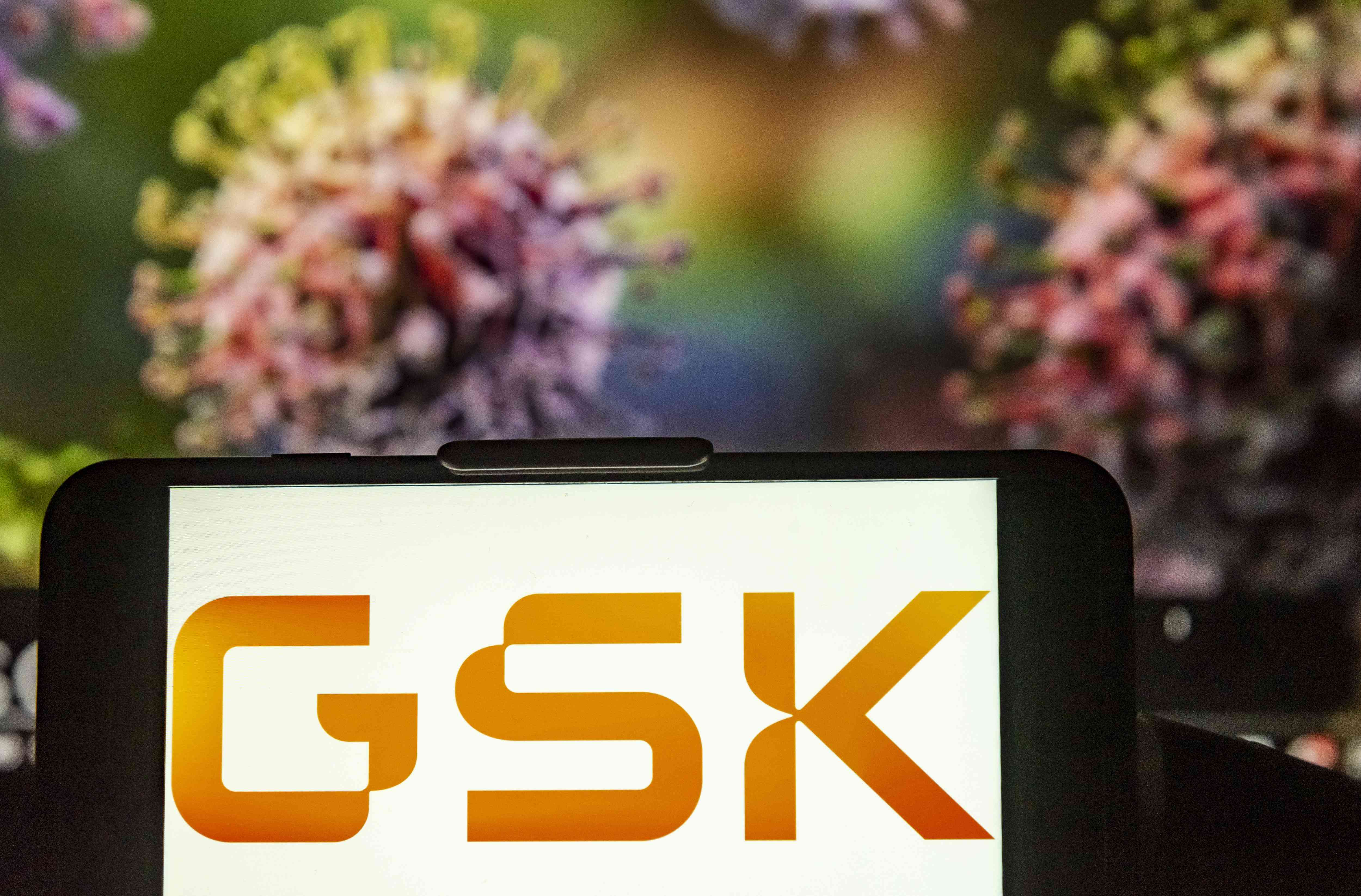 The GSK logo seen on the screen of a mobile device 