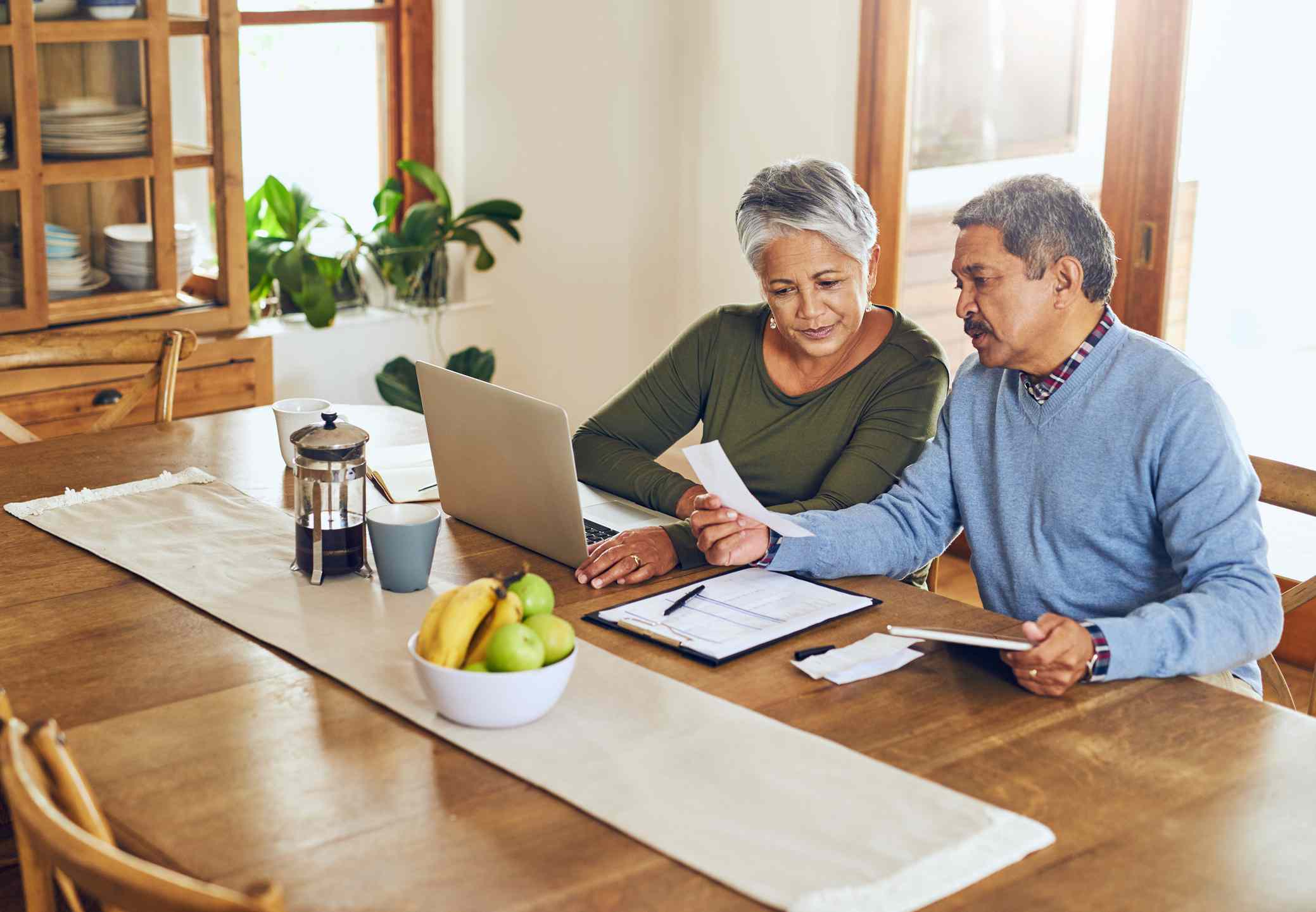 Couple sitting together financial work