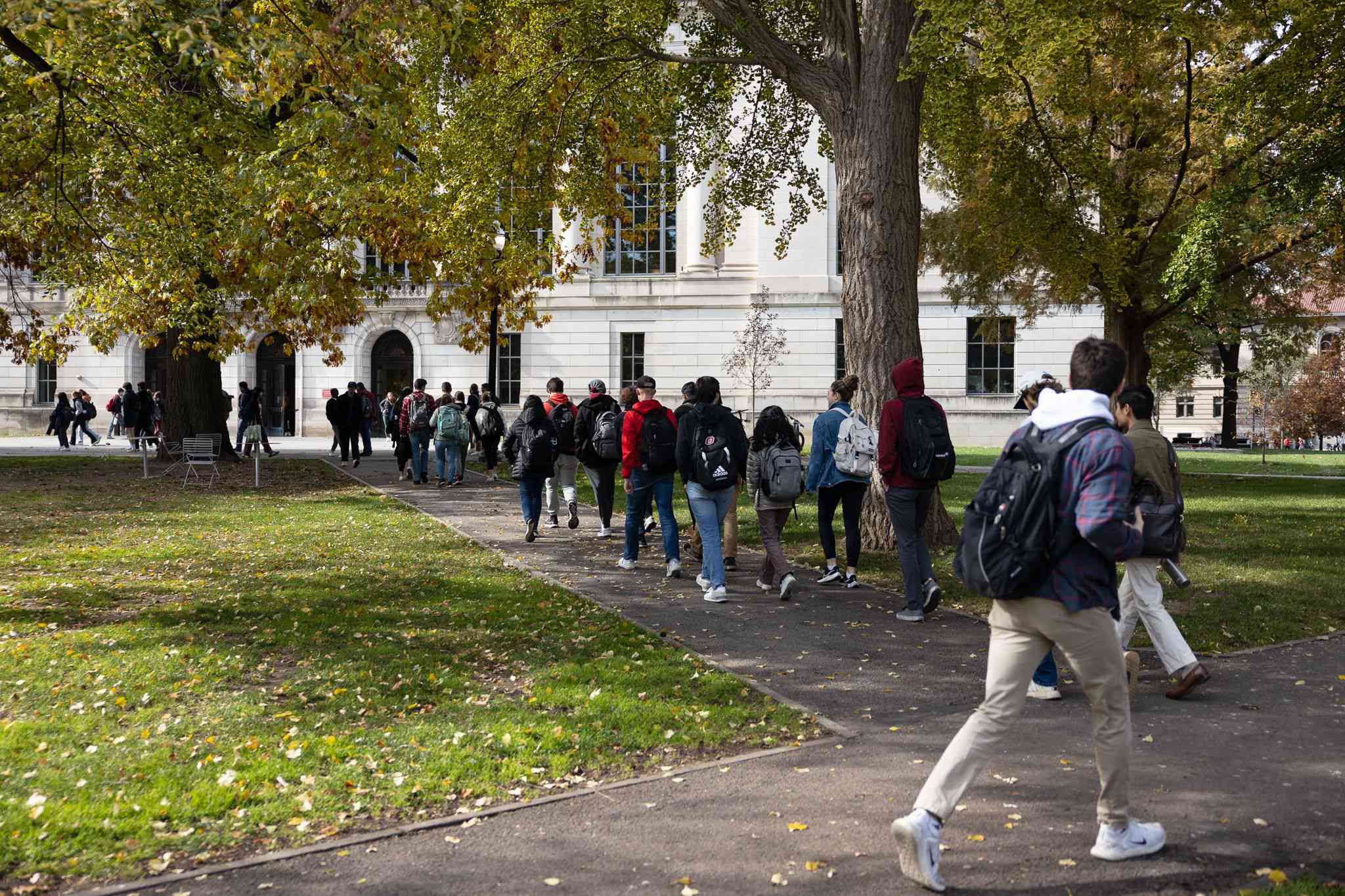 Students walk across the campus of The Ohio State University in Columbus, Ohio on November 6, 2023.