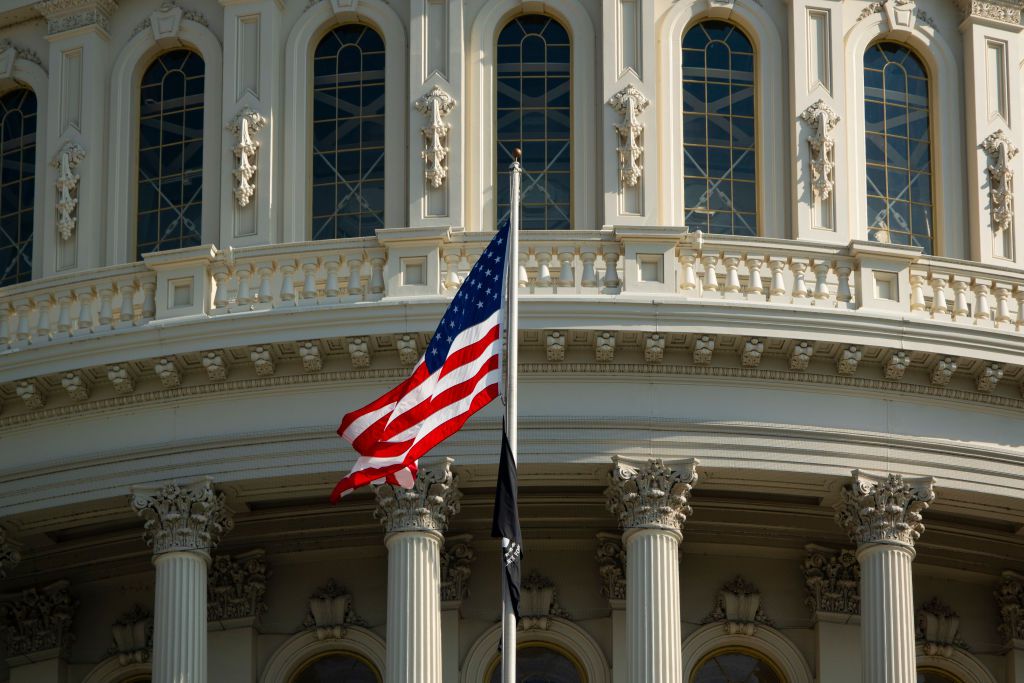  An American flag flies outside the U.S. Capitol building on a clear, fall day on November 06, 2023 in Washington DC. 