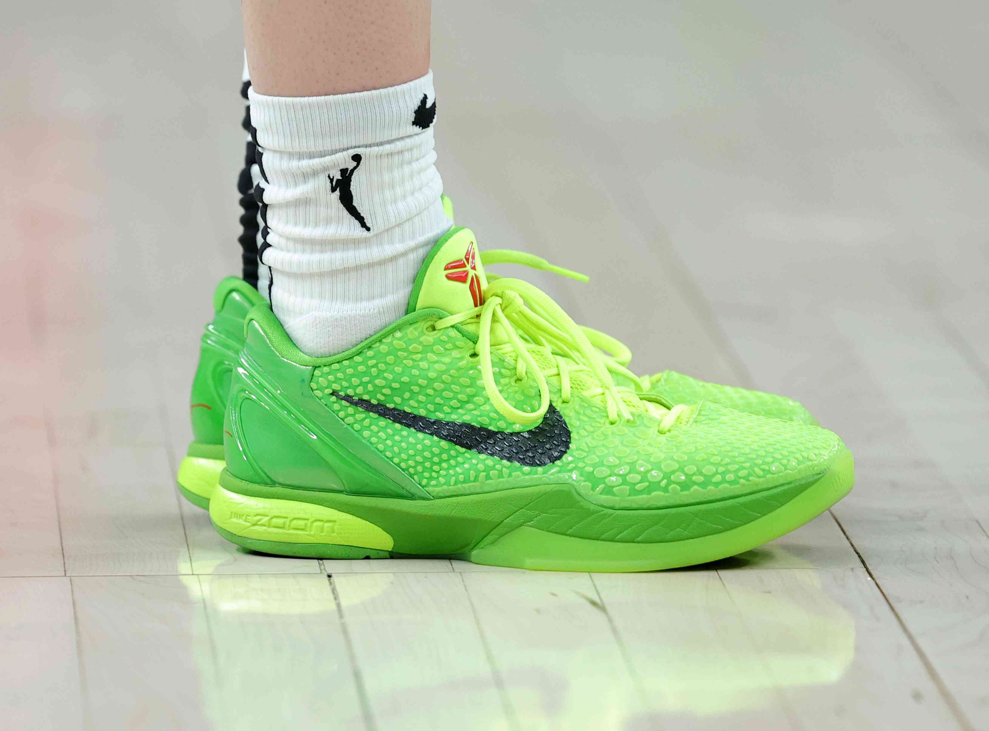 Pro basketball player Caitlin Clark's green shoes in a game on July 2. 