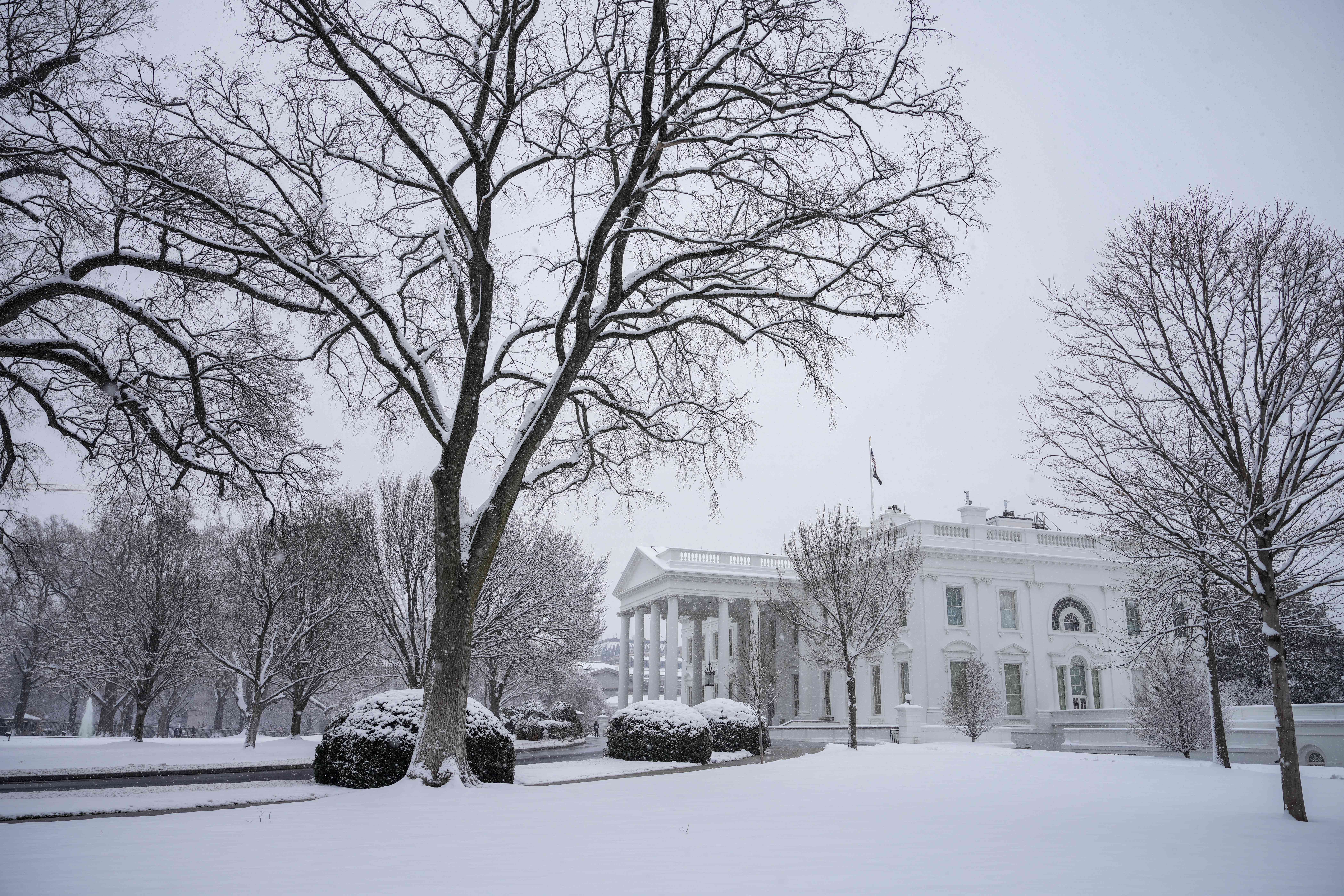 Snow covers the White House grounds January 19, 2024 in Washington, DC. This afternoon, U.S. President Joe Biden will hold an event with bipartisan mayors attending the U.S. Conference of Mayors Winter Meeting at the White House.