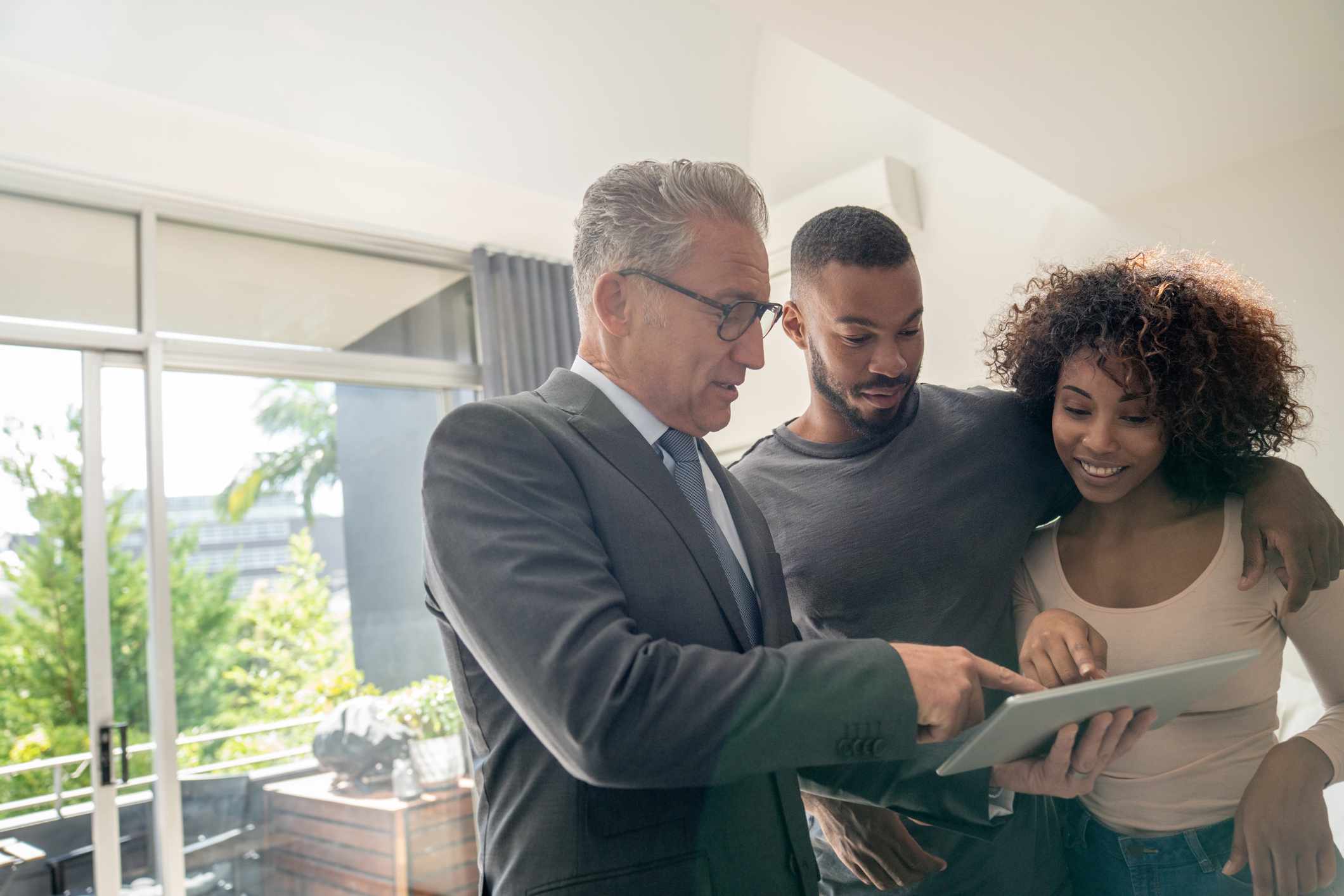 financial advisor speaking with couple