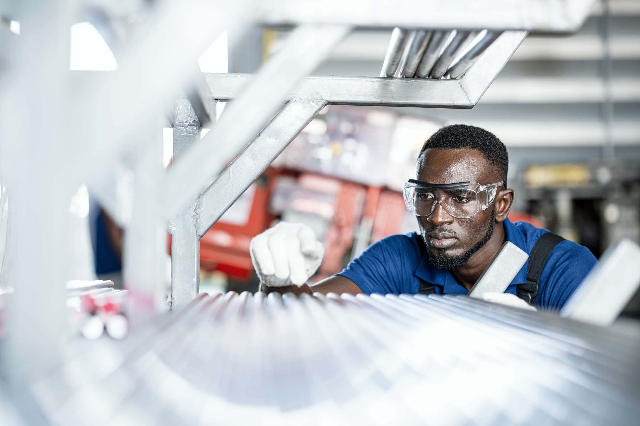 Quality Control Engineer Inspecting a Steam Pipe