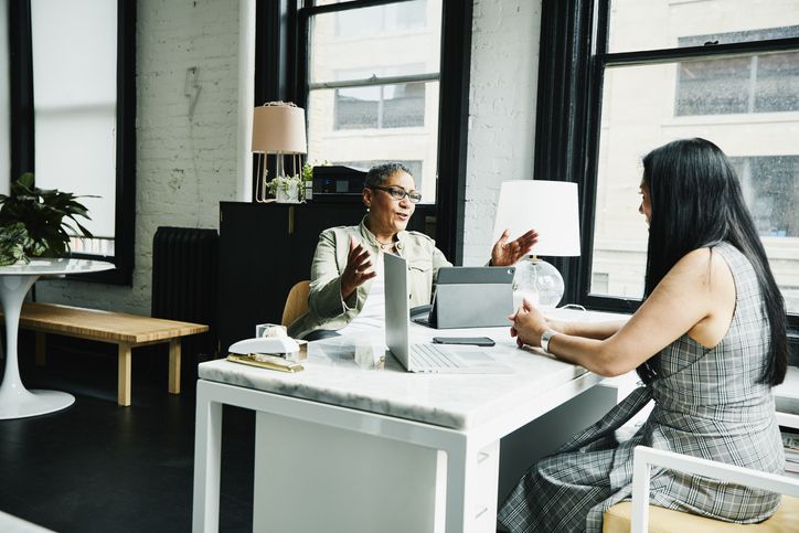 Woman talking to financial advisor